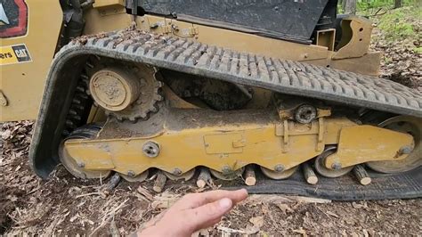 how to put tracks back on a avs skid steer|skid steer popped off track.